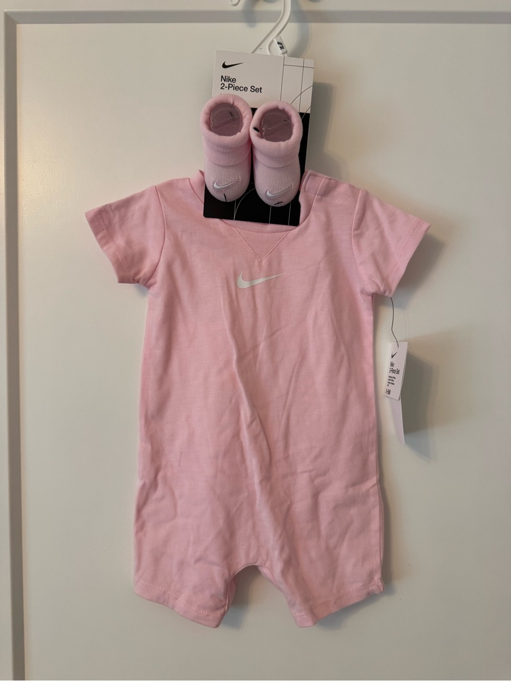Nike Pink Short-Sleeve Baby One-Piece with Matching Socks